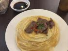 Beef is a very popular protein in dishes throughout Taiwan! Here is a plate of rice covered by an omelet and beef