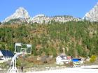 Hoops with a view: a basketball court surrounded by the beautiful mountains of Northern Albania