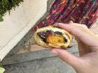 A homemade mooncake with red bean and salted egg yolk
