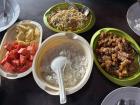 Chicken teriyaki with fried noodles, white rice and fruit