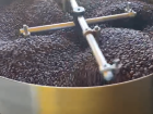 Coffee being roasted in a huge machine that smelled DELICIOUS