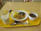 A typical Czech school lunch, complete with a daily soup knedliky (dumplings), meat, meat, vegetables, and a glass of milk. 