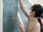 Many classrooms in Vietnam have chalkboards, and students write on them during lessons