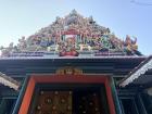 A traditional place of worship with many colors and usually a specific deities, for example this is for Krishna (Krishna represents divine love, compassion, protection, and righteousness) 