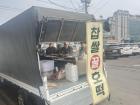 The back of the truck where 호떡 (hotteok) is being cooked and sold