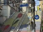 Steep stairs with flowers painted onto them in Busan
