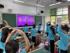 The students love to dance and sing in class