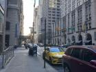Walking through the streets of New York City in the morning