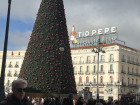Plaza del Sol in the daylight. The streets are filled with holiday decorations
