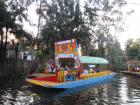 Riding a trajinera (boat) through Xochimilco is a colorful way to experience local culture