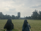 A peaceful walk through the campus lawns at UNAM, where Alexa and a coworker enjoy a moment between buildings