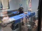 An echidna going to the doctor--they make the echidna sleep so that the vet can take a close look at it