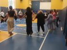 Students doing a traditional hora dance at school