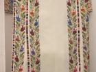 This is a beautiful thobe that features fishbone stitching along the panel borders 