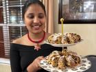 Me serving "Dresdner Stollen" that I brought back from Germany for my Christmas party back home in the U.S. 