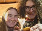 My cousin and I at a German Christmas market with French macaroons