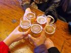 A cheers, or "prost" in German, with a group of friends at Oktoberfest