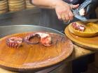 Sometimes they even use scissors to cut the octopus after cooking it