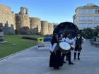 A traditional Galician band performing outside the 1,700-year-old wall in Lugo