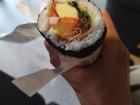 Gimbap is a popular snack that's easy to get and fulfilling; it looks like sushi, but it contains no raw fish