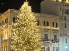 A large Christmas tree in one of the center squares