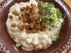 A bowl of bryndzové halušky (BRIN-dzoh-veh hah-LOOSH-kee)