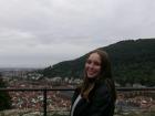 Here I’m standing at a viewpoint overlooking the Neckar River in Heidelberg. The city’s red rooftops and bridges make it one of Germany’s most scenic views.
