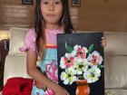 I love painting and drawing many things, such as flowers, my family and animals