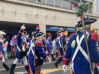 People Dressed as Prussian Soldiers During Karneval (The Guns Have Flowers Inside)