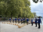 People playing the Alphorn