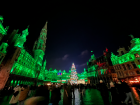 The Grand Place is lit up at night to celebrate Christmas