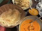 I ordered butter chicken, kerala peratha (which is like a soft, flakey flatbread), and fish biryani (a meat and rice dish). 