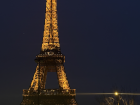 The lights on the Eiffel Tower in Paris glowing in the night