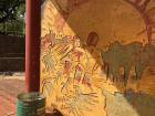 Un mural que se muestra el viaje del inmigrante
