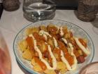 Patatas bravas are a key part of tapa culture in Spain, think roasted potatoes with a delicious sauce