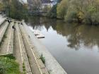 The river and "land stairs", or Landtreppe, on the River Lahn on a cloudy day