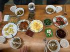 "Banchan" (small dishes), 'kongnamul" (sprout soup), potatoes and more