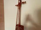 This is a horse head fiddle, a traditional Mongolian instrument