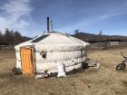 A Mongolian ger from the countryside. There is a solar panel on the top is for the lights and fridge inside.
