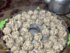 These are buuz steamed on a ger stove, they are usually frozen first and then steamed for about 15 minutes