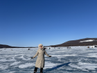Frozen Lake Khövsgöl, where people walk and even cars drive across, with Mongolia’s “eternal blue sky” in the background