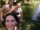 Swimming in a freezing river at my campsite with some friends