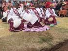 Women dancing Mokhibo at a community welcome ceremony.