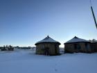 Traditional rondavel houses in the snow