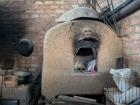 Oven and fire stove (on the left). The large oven we only used for Dia de los Muertos/Santos to make bread.