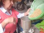 Host mom and I making arroz de trigo from trigo harvested at their farm