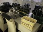 Baskets woven out of recycled packaging material often used in agricultural production