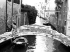 A person enjoying the canals in Venice