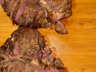 La Bistecca alla Fiorentina is a classic steak dish from Tuscany, typically cooked rare