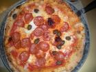 One of my favorite pizzas I've had here in Italy (with pepperoni, olives and spicy sauce)